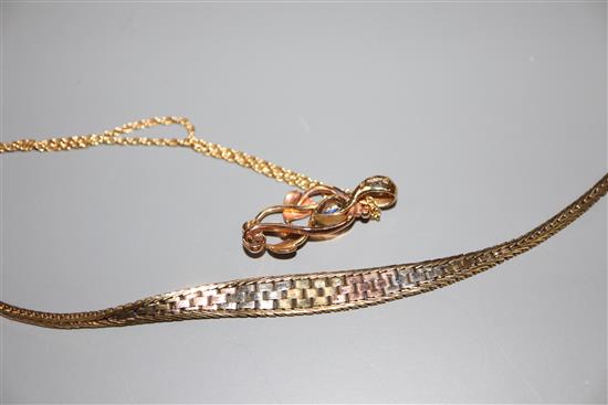 A 9ct three-colour gold bracelet and a 9ct two-colour gold and sapphire pendant, gross 14.2 grams.